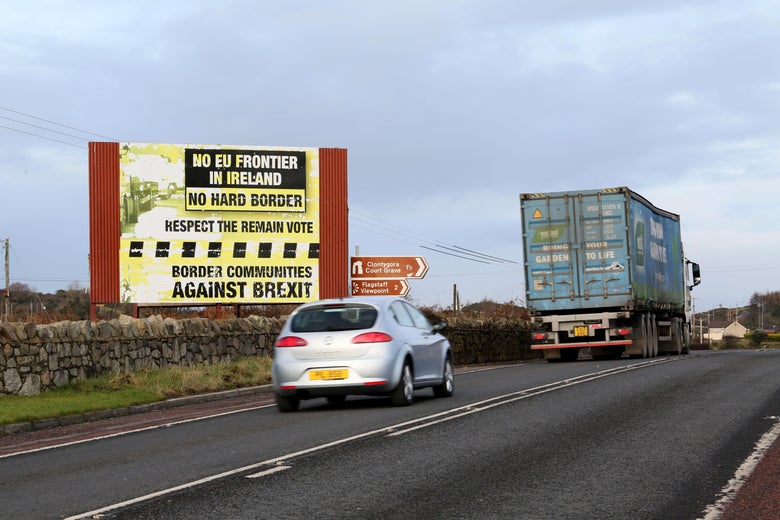 Traffic passes a Brexit Border poster on the Dublin road Co Armagh border, between Newry in Northern Ireland and Dundalk in the Irish Republic, on December 1, 2017,
The European Union will not accept Britain's Brexit offer if Ireland is not satisfied with proposals for future border arrangements, EU President Donald Tusk said in Dublin on December 1, 2017. / AFP PHOTO / Paul FAITH (Photo credit should read PAUL FAITH/AFP/Getty Images)